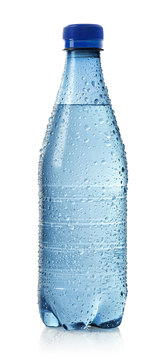 Light blue bottle of cold water with drops