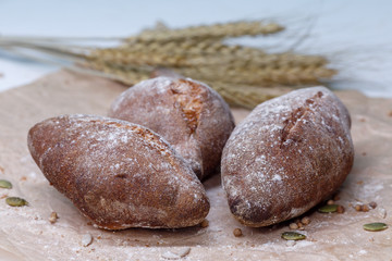 Homemade black bread, small buns of rye bread