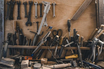 carpenter tools to work on a wooden background