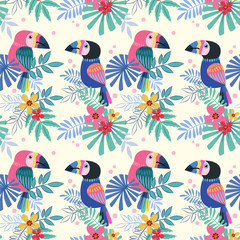 Cute  toucans bird with  with tropical flowers seamless pattern.