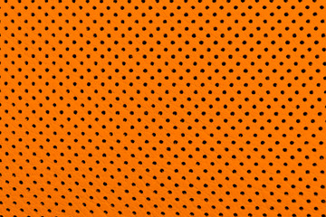 Luxury Car orange leather interior.  Part of perforated leather car seat details. Brown Perforated...