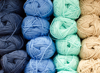 Colored balls of yarn. View from above. Rainbow colors. All colors. Yarn for knitting. Skeins of yarn.