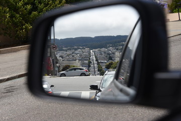 San Francisco in car mirror