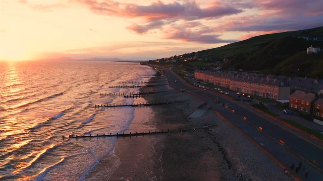 Stormy Sunset over Coastal Town in North Wales,UK