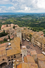 Fototapeta na wymiar Panoramic aerial view of the city and surrounding countryside from the towers of San Gimignano in Tuscany, Italy