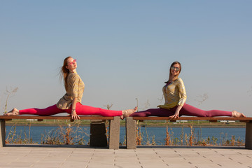 Yoga in the park - meditation and breathing exercises with an experienced trainer, Portrait