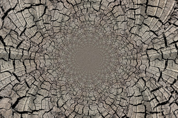 abstract image in a kaleidoscope with cracks on the ground