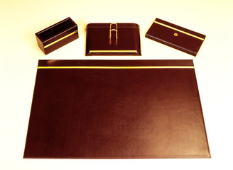 Desk sets contain matching or coordinated desk accessories.