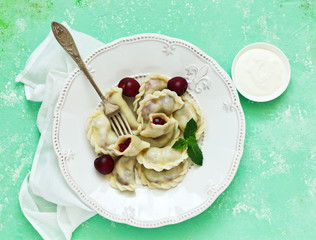 Dumplings with cherries. Ukrainian and Belarusian cuisine.