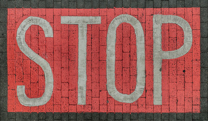 stop sign on brick background
