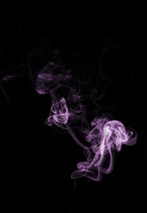 Pink purple violet smoke or fog on isolated black background