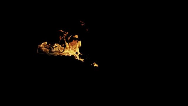 Fire Flames Igniting And Burning - Slow Motion. A line of real flames ignite on a black background. Real fire. Transparent background. PNG + Alpha. 