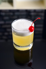 Cocktail whiskey sour, classic cocktail with bourbon and egg
