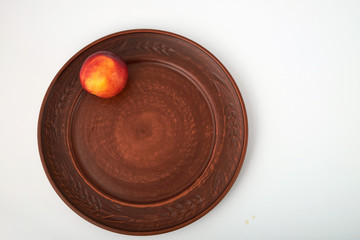 Ripe juicy nectarines isolated on white background