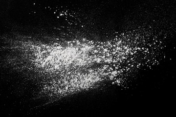 White powder isolated on black background, top view with clipping path