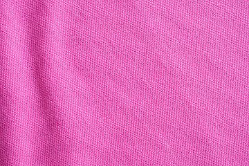 Pink cotton fabric texture closeup background