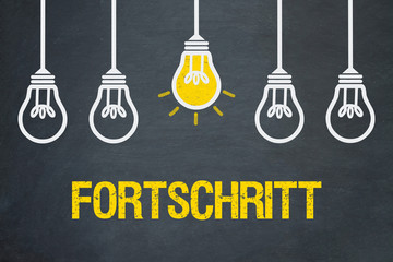 Fortschritt / Tafel mit Glühbirnen