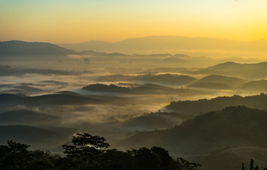 Beautiful Landscape of mountain layer in morning sun ray Doi Sa Ngo mountain at Chiang Saen district of Chiang Rai province of Thailand 