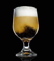 glass of beer on a white background
