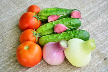  Fresh vegetables. Tomatoes, cucumbers, garlic, onions.