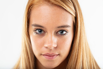 Attractive young girl staring intently at camera