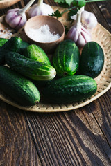 Bowl of freshly picked organic cucumbers and garlic, fresh vegetables salad