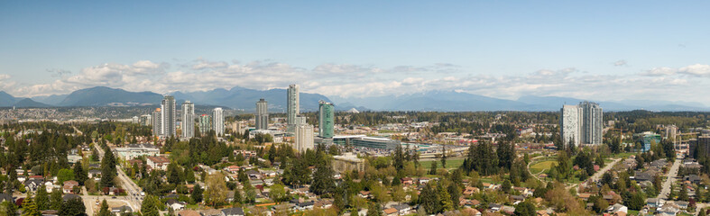 Panoramic view of residential neighborhood in the city during a sunny day. Taken in Greater Vancouver, British Columbia, Canada.