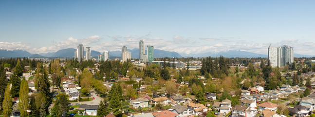 Panoramic view of residential neighborhood in the city during a sunny day. Taken in Greater Vancouver, British Columbia, Canada.