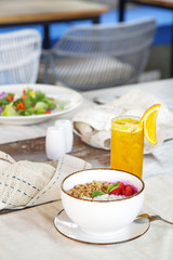Healthy organic vegetarian food served on the restaurant table.