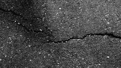 Obraz premium crack and texture of asphalt road - top view background.