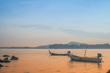 Naklejka premium Wooden Boat at Sunrise, Nai Yang Beach, Phuket, Thailand