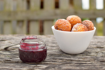 donuts in nature lie on a wooden background
