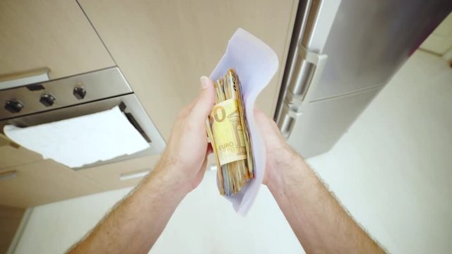 Envelope with a pack of money person point of view 4K