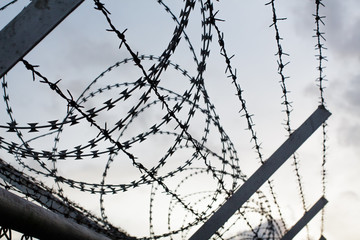 Background of prison warfare, barbed wire fence in Phuket Thailand