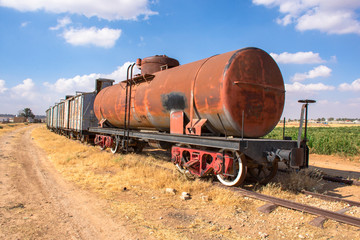 Fototapeta na wymiar Old rust train with railway in Jordan 