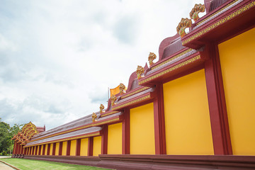 Obraz premium Wall Background lawn grass Temple Mai Bang Thong. Wat mahathat mongkhon vajira in Krabi, Thailand