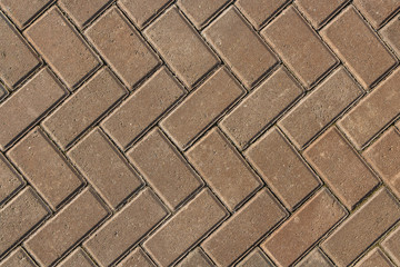 Beautiful horizontal texture of part of a new gray brick path is on the photo