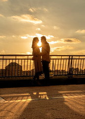 young couple at sunset
