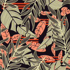 Abstract bright seamless pattern with colorful tropical leaves and plants on black background. Vector design. Jungle print. Floral background. Printing and textiles. Exotic tropics. Fresh design.