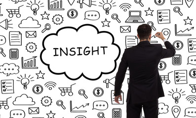 Business, technology, internet and networking concept. Young entrepreneur showing keyword: Insight