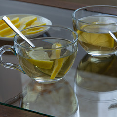 Top view of lemon tea glasses. Drinks flat lay. Seasonal refreshment break