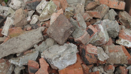 background of broken bricks and stone for construction