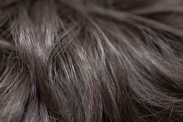 Closeup to dark and soft hair background 
