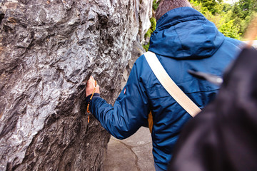 Pilgrimage of believers in front of the holy grotto of Lourdes