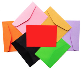 A lot of colored envelopes on a white background. Top view.