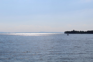 the sunlight shimmers on Lake Constance