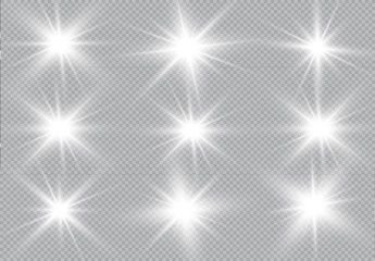 Set of Vector glowing light effect stars bursts with sparkles on transparent background. Transparent stars.