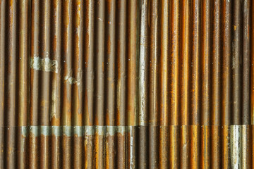 Brown and colorful refined metal sheets. Old factory texture