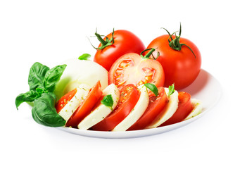 Сaprese salad with ripe tomatoes and mozzarella cheese with fresh basil leaves. Italian food. 