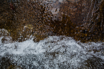 Ton Kloi Waterfall ,in the forest at Ban Siam,Ranong,Thailand. Used in editing.Create a graphic,Creative travel business